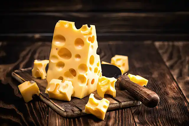 5 Healthiest Types of Cheese to Eat, According to Dietitians Modista - Жіночий журнал Photo created by AI for MODISTA - Swiss cheese longevity benefits