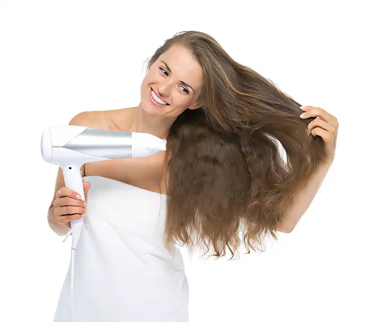 Blow-dry your hair in sections starting from the bottom layers